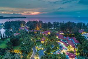 an aerial view of a resort at night at Dusit Thani Laguna Phuket in Bang Tao Beach