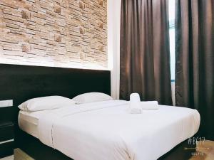 Postel nebo postele na pokoji v ubytování KU-3 HOTEL