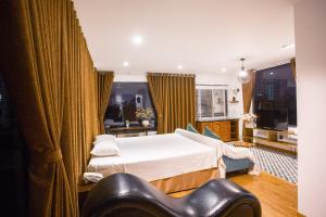 Voodi või voodid majutusasutuse Dinh Ami Hanoi Hotel toas