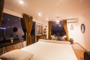 Voodi või voodid majutusasutuse Dinh Ami Hanoi Hotel toas