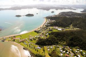 an aerial view of a beach and the ocean at Waitangi Beach House in Paihia