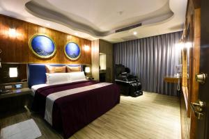 Postel nebo postele na pokoji v ubytování Meng Siang Motel