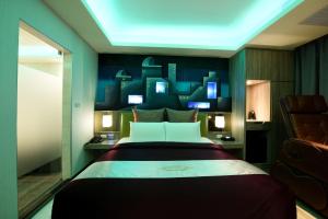 TV a/nebo společenská místnost v ubytování Meng Siang Motel