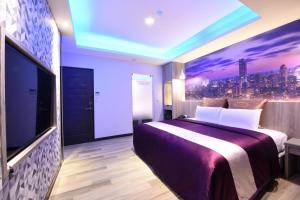 Postel nebo postele na pokoji v ubytování Meng Siang Motel