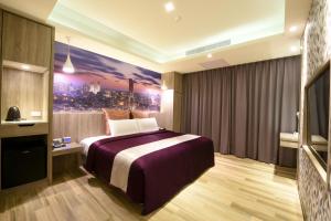 Postel nebo postele na pokoji v ubytování Meng Siang Motel + 13 fotografií