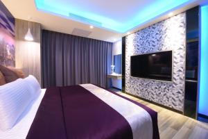 TV a/nebo společenská místnost v ubytování Meng Siang Motel