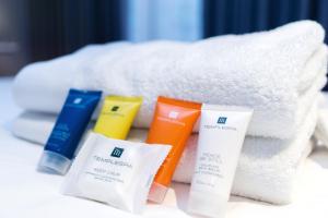 Rúm í herbergi á G2 Hotel Myeongdong