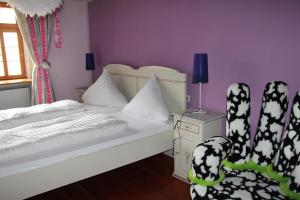 Postel nebo postele na pokoji v ubytování Hotel Turmdieb