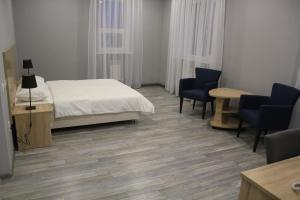 Hotel Inju Hills客房内的一张或多张床位