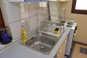 Kuchyň nebo kuchyňský kout v ubytování Apartment Elmari + 37 fotografií