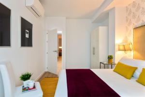 Posteľ alebo postele v izbe v ubytovaní Genteel Home Baños + 37 fotografií