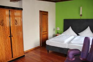 Postel nebo postele na pokoji v ubytování Hotel Turmdieb