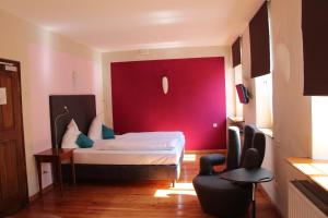 Postel nebo postele na pokoji v ubytování Hotel Turmdieb