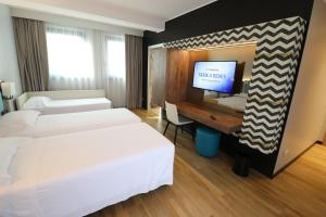 Μια τηλεόραση ή/και κέντρο ψυχαγωγίας στο Hotel Domenichino