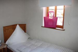 Postel nebo postele na pokoji v ubytování Hotel Turmdieb