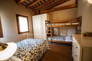 Двухъярусная кровать или двухъярусные кровати в номере Particolari del Brenta
