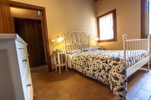Postel nebo postele na pokoji v ubytování Particolari del Brenta