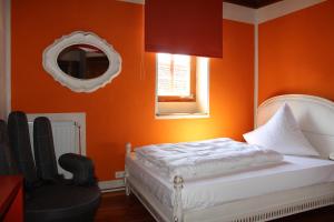 Postel nebo postele na pokoji v ubytování Hotel Turmdieb