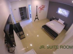 Letto o letti in una camera di GC Suites