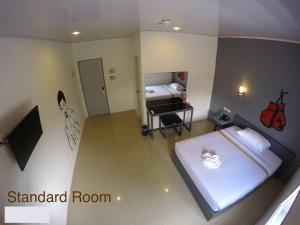 Letto o letti in una camera di GC Suites