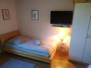 En eller flere senge i et værelse på APARTMENT CHALET -BOHINJ- Pokljuka- Triglav National Park