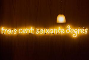 a neon sign that says tigers cant soxarma degrees at Dar El Marsa Hotel & Spa in La Marsa