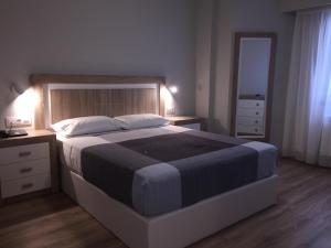 Posteľ alebo postele v izbe v ubytovaní Hotel Celanova