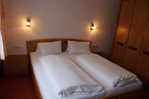 Postel nebo postele na pokoji v ubytování Haus Birgit
