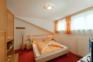 Postel nebo postele na pokoji v ubytování Haus Birgit