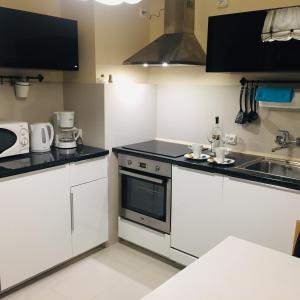 Kuchyňa alebo kuchynka v ubytovaní Apartament Centrum Park