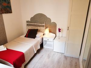 A bed or beds in a room at Hotel Horizonte