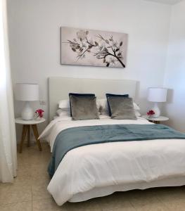 Posteľ alebo postele v izbe v ubytovaní Apartamento Tabaybas