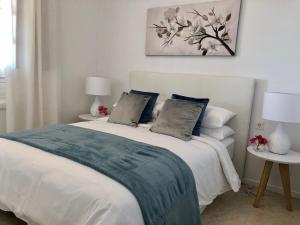 Posteľ alebo postele v izbe v ubytovaní Apartamento Tabaybas