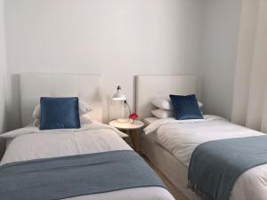 Posteľ alebo postele v izbe v ubytovaní Apartamento Tabaybas