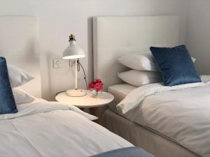Posteľ alebo postele v izbe v ubytovaní Apartamento Tabaybas