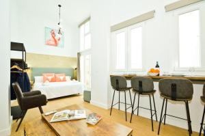 Posteľ alebo postele v izbe v ubytovaní NineSuites