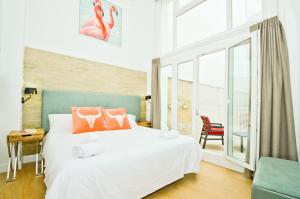 Posteľ alebo postele v izbe v ubytovaní NineSuites