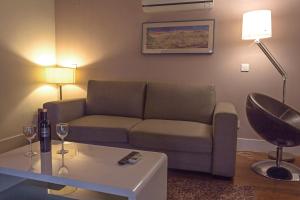 A seating area at Los Ojos de la Mora Apartamentos Boutique