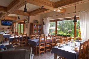 Reštaurácia alebo iné gastronomické zariadenie v ubytovaní Willa Trela