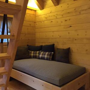 Postel nebo postele na pokoji v ubytování Alpine Chalet