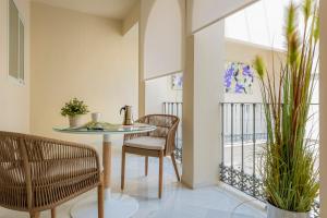 Balkon lub taras w obiekcie Suites Sevilla Plaza