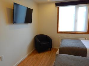 TV a/nebo společenská místnost v ubytování Hostal Buenavista Patagonia
