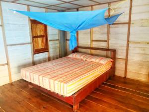 Postel nebo postele na pokoji v ubytování Lae Tawan Bungalow