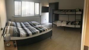 Postel nebo postele na pokoji v ubytování Hotel Ikast