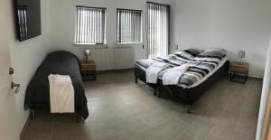 Postel nebo postele na pokoji v ubytování Hotel Ikast