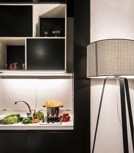 Kuchyň nebo kuchyňský kout v ubytování Corso 281 Luxury Suites