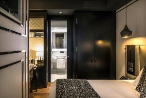 Postel nebo postele na pokoji v ubytování Corso 281 Luxury Suites
