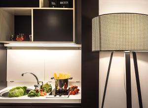 Kuchyň nebo kuchyňský kout v ubytování Corso 281 Luxury Suites