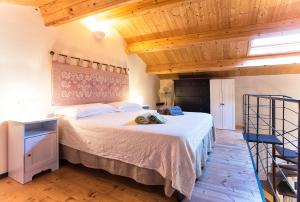 Una cama o camas en una habitación de Lucia Minerva 18