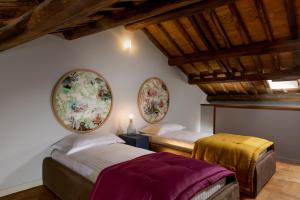Palm Suites - Small Luxury Hotels of the World客房内的一张或多张床位